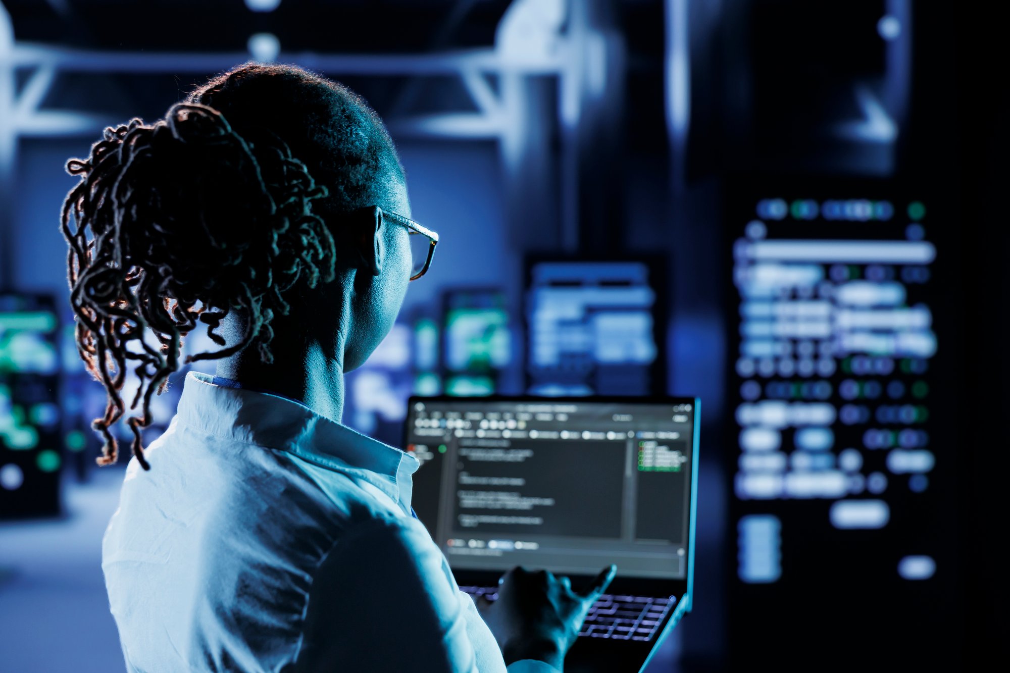 data-center-technician-runs-code data-center-technician-runs-code